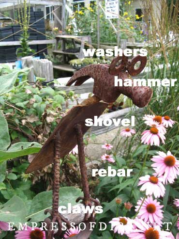 Garden art made from old tools. 