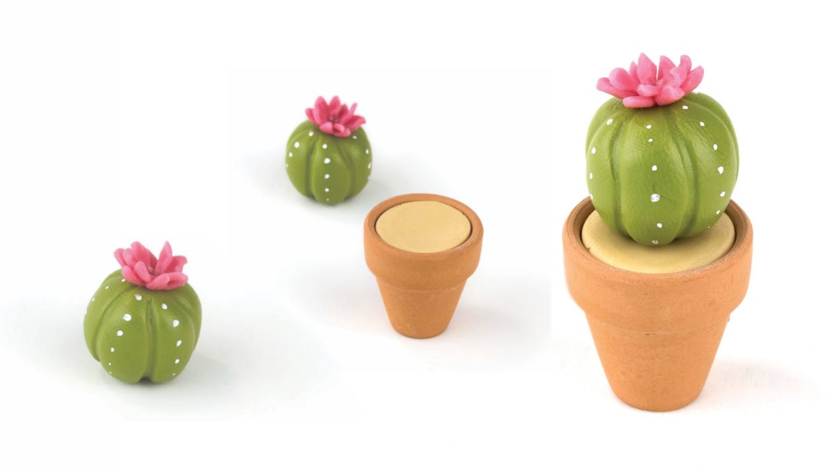 Tiny clay cactus and mini clay pot.