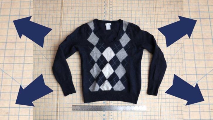 Sweater shrunken in the dryer now ready to be returned to original size.